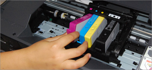 Changer une cartouche sur une imprimante EPSON